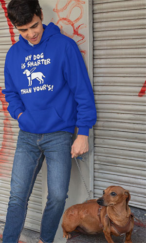A boy wearing a blue hoodie with my dog is smarter than your dog!