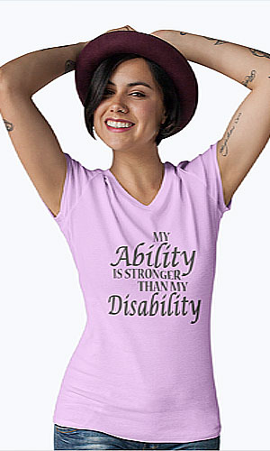 A woman wearing a pink shirt with my ability is not my disability